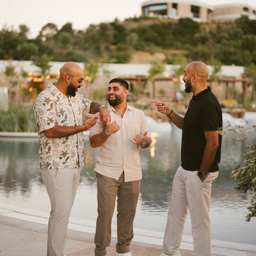 DJ Chonkx with friends at a destination wedding